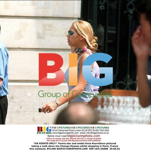 Anna Kournikova Walks Champs Elysees in Paris