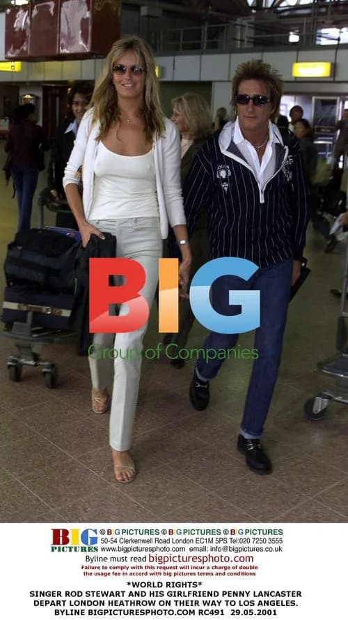 Rod Stewart and Penny Lancaster depart Heathrow