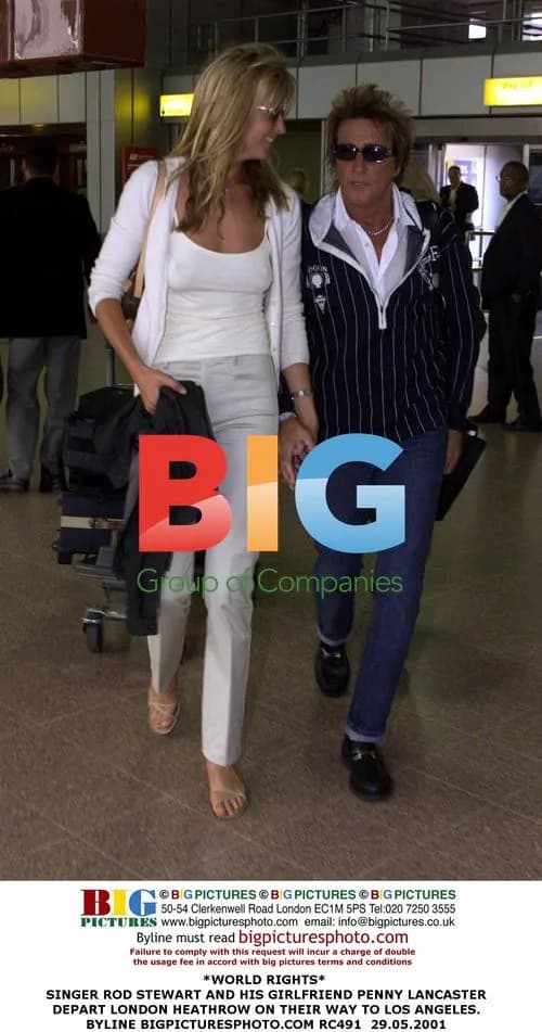 Rod Stewart and Penny Lancaster Depart Heathrow