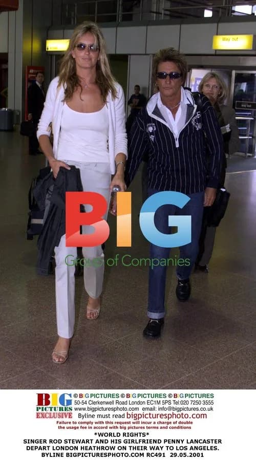 Rod Stewart and Penny Lancaster depart Heathrow