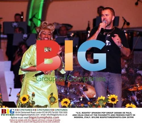 Spanish pop group Jarabe de Palo and Celia Cruz at Pavarotti party