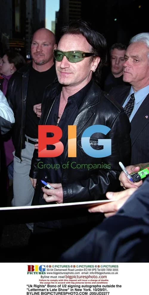 Bono of U2 Signing Autographs Outside Letterman's Late Show