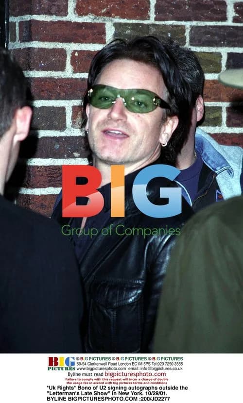 Bono of U2 Signing Autographs