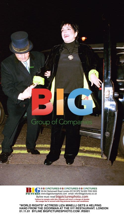 Liza Minelli gets help from doorman at The Ivy