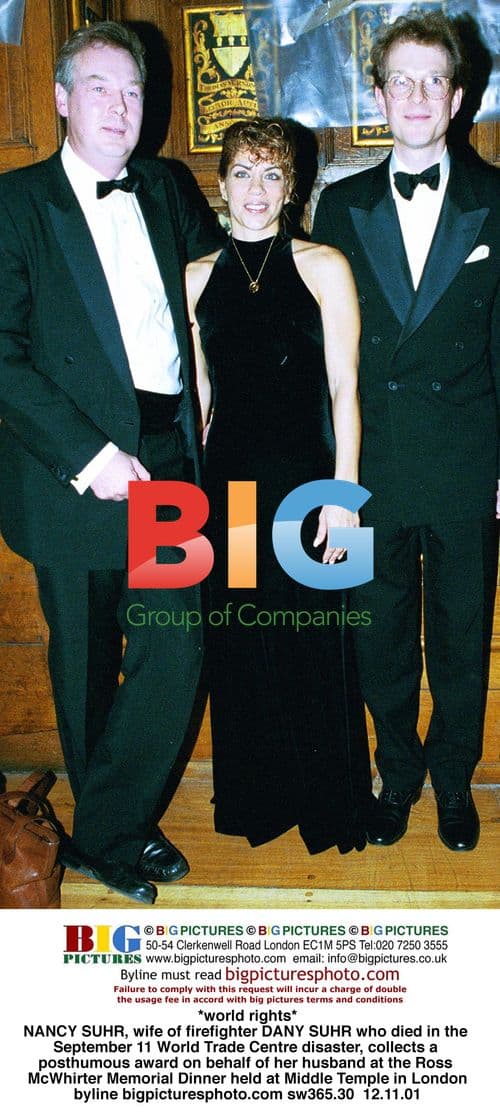 Nancy Suhr Collects Award for Late Husband