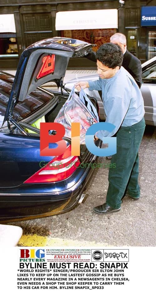 Elton John Buys Magazines in Chelsea