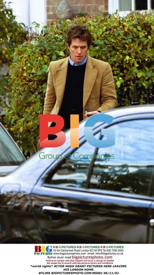 Hugh Grant Leaves London Home