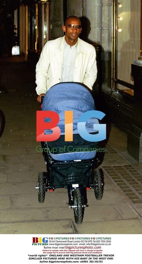 Trevor Sinclair with his baby in the West End