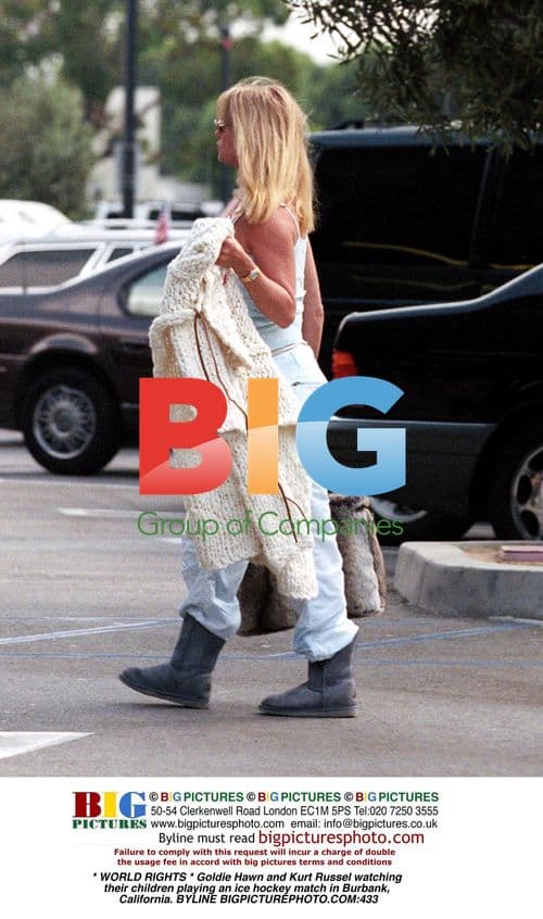 Goldie Hawn and Kurt Russel Watch Kids Play Hockey