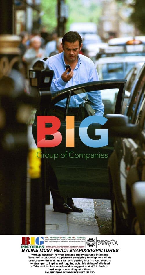 Will Carling struggles with briefcase