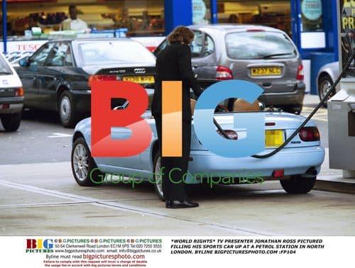 Jonathan Ross Filling Up Sports Car in London