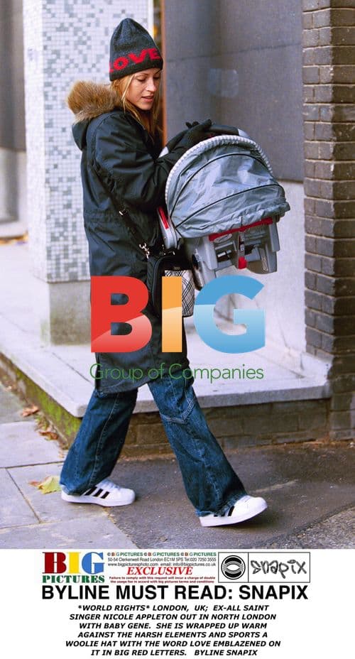 Nicole Appleton with baby Gene in London