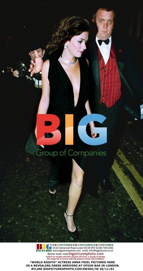 Anna Friel Arrives at Opium Bar in Revealing Dress