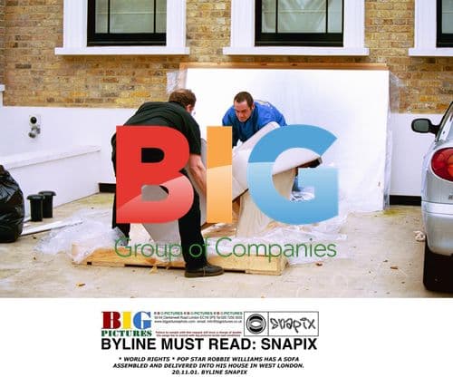 Robbie Williams Receives Sofa Delivery