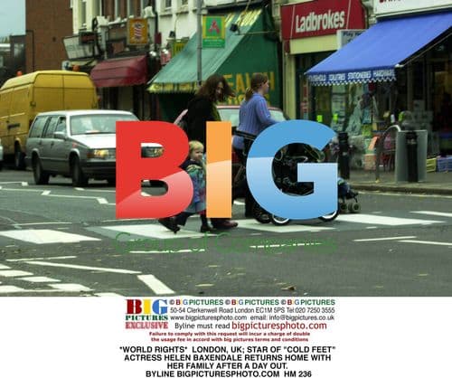 Helen Baxendale Returns Home with Family