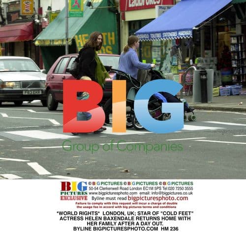 Helen Baxendale Returns Home with Family