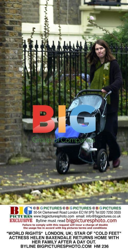 Helen Baxendale Returns Home with Family