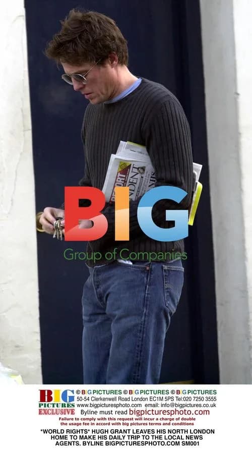Hugh Grant Leaves North London Home