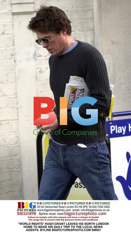 Hugh Grant leaves home for news agents