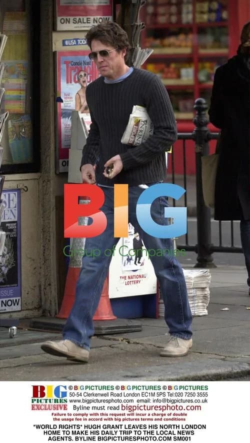 Hugh Grant Leaves North London Home For News Agents