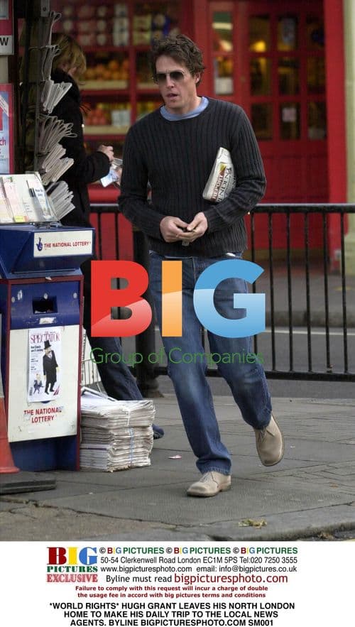 Hugh Grant leaves North London home