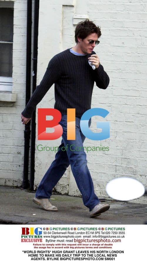 Hugh Grant leaves home to visit news agent