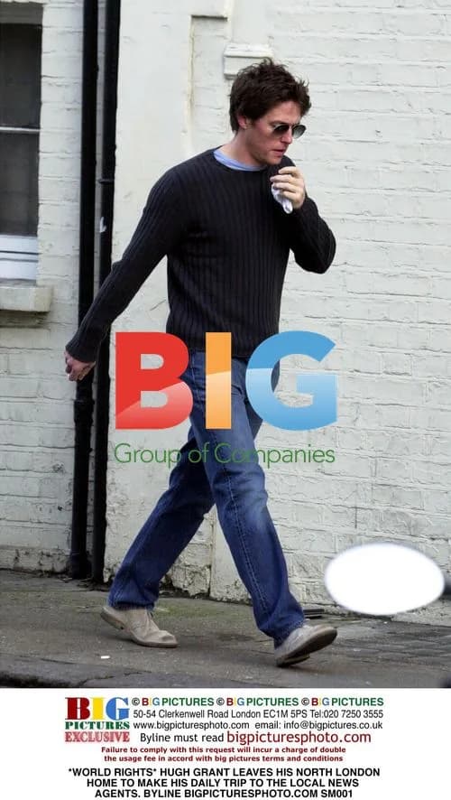 Hugh Grant leaves home to visit news agent