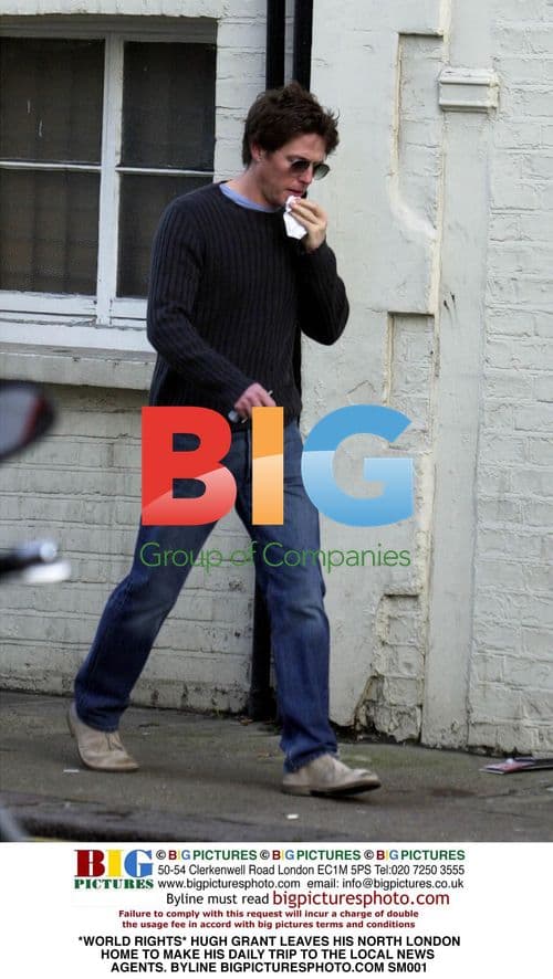 Hugh Grant leaves home to buy newspaper
