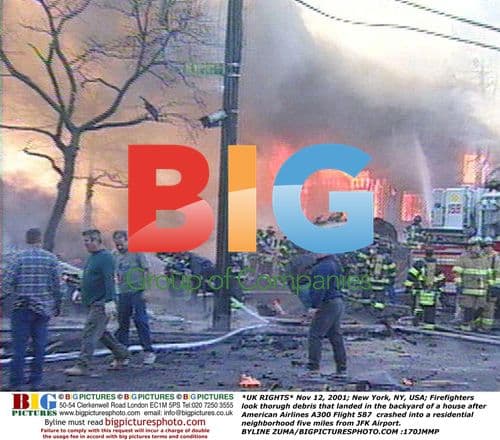 Firefighters search debris after plane crash