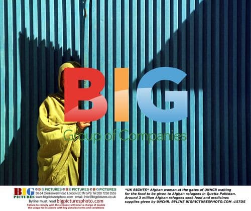 Afghan woman at UNHCR gates in Quetta