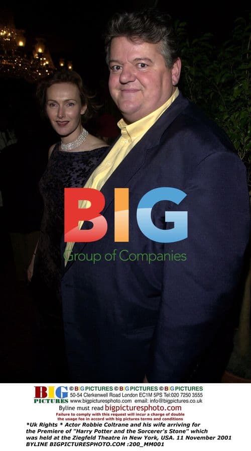 Robbie Coltrane and wife at Harry Potter premiere