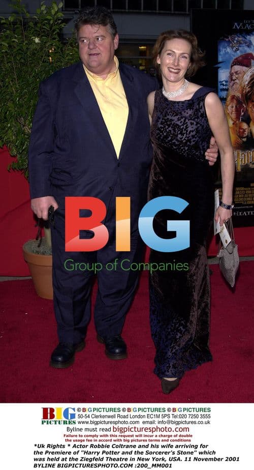 Robbie Coltrane and wife at Harry Potter premiere