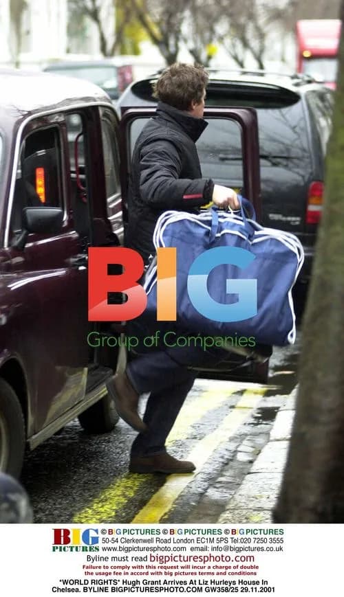 Hugh Grant Arrives At Liz Hurley's House