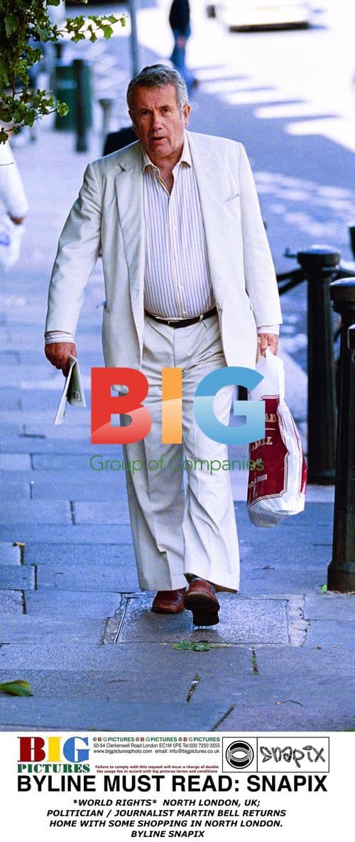 Martin Bell Returns Home with Shopping