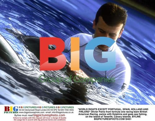 Olivier Panis swims with Dolphins in Tenerife