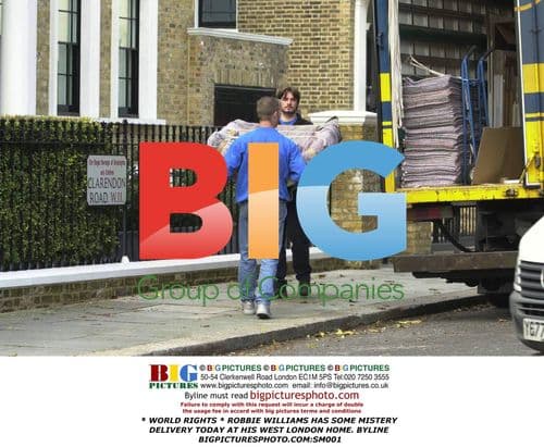 Robbie Williams Receives Mystery Delivery