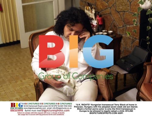 Hungarian transsexual Terry Black adopts child