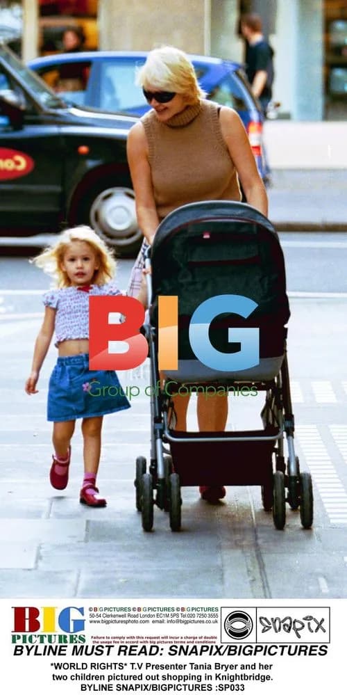 T.V Presenter Tania Bryer and children shopping in Knightbridge
