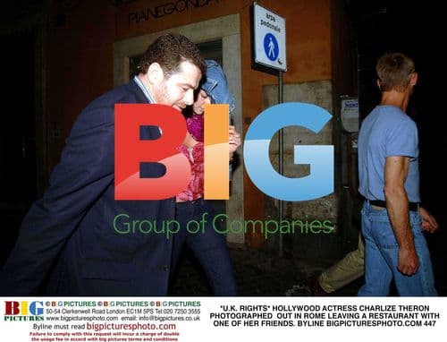 Charlize Theron out in Rome with friend