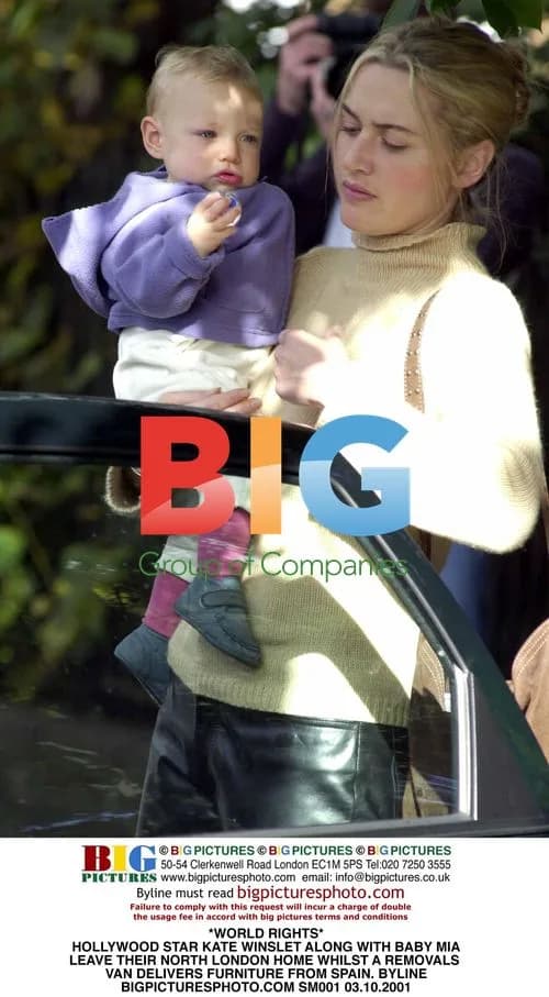 Kate Winslet with baby Mia leaving London home