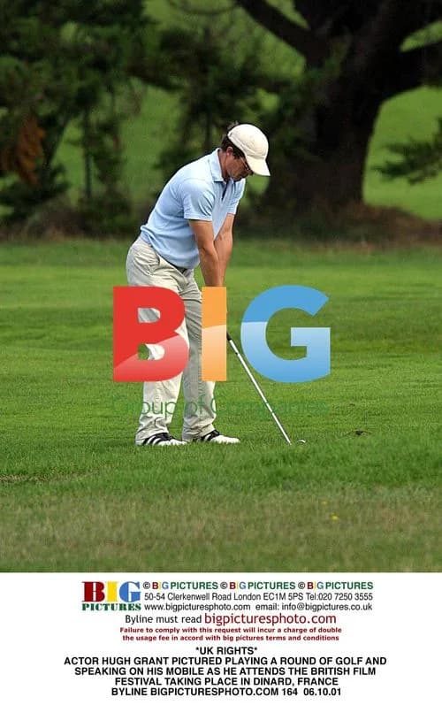 Hugh Grant playing golf in Dinard, France