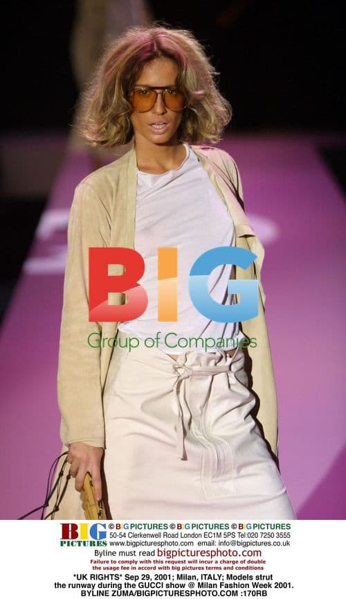 Models walk GUCCI runway at Milan Fashion Week 2001