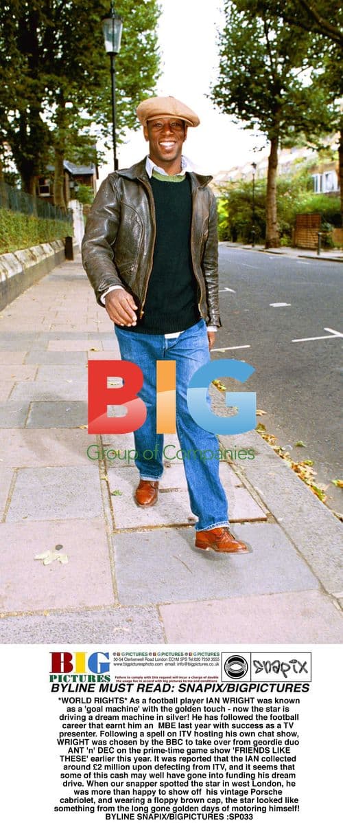 Ian Wright Drives Silver Porsche