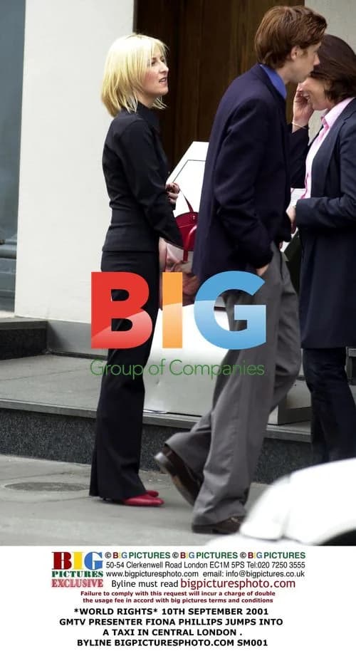 Fiona Phillips Jumps Into Taxi in London