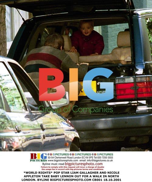 Liam Gallagher and Nicole Appleton take baby Lennon for walk