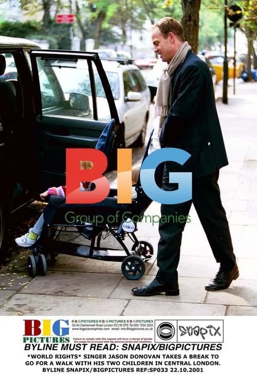 Jason Donovan out with children in London