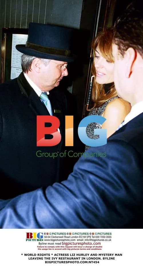 Liz Hurley and Mystery Man Leaving The Ivy