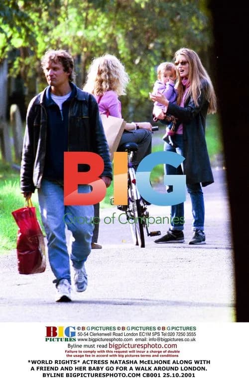 Natasha McElhone and friend with baby in London