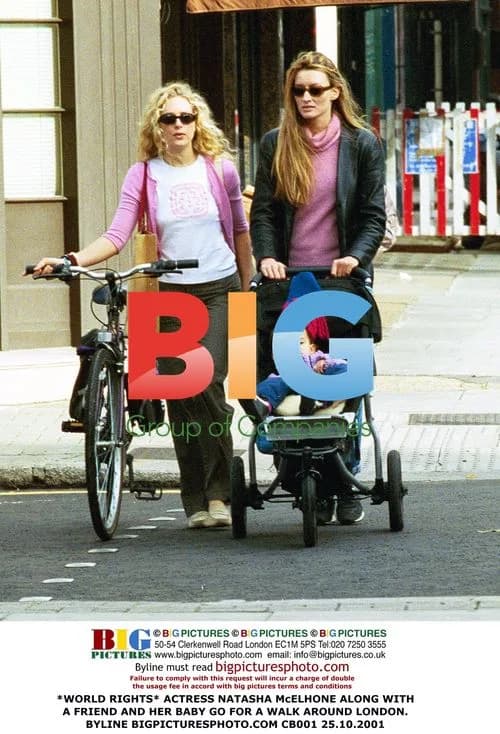 Natasha McElhone and friend with baby in London