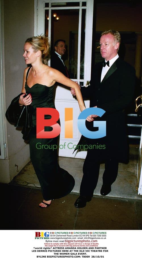 Actress Amanda Holden and partner Les Dennis